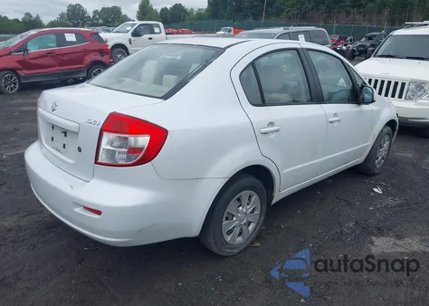 2011 Suzuki Sx4 Le/Le Anniversary Edition из США, поврежденный, VIN JS2YC5A28B6300723